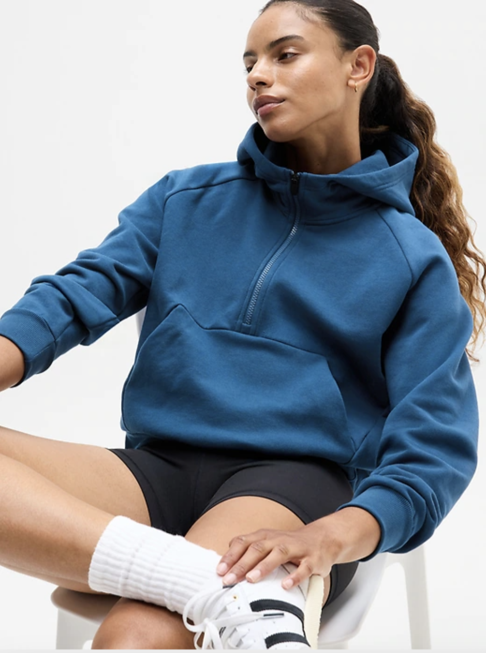 Maritime (blue) fleece half zip hoodie from Athleta shown on model